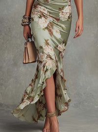 Anne™ | Robe longue asymétrique en satin vert à col en V, manches bouffantes et imprimé floral