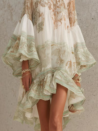 Solange | Robe courte asymétrique en mousseline verte à volants et manches cloches